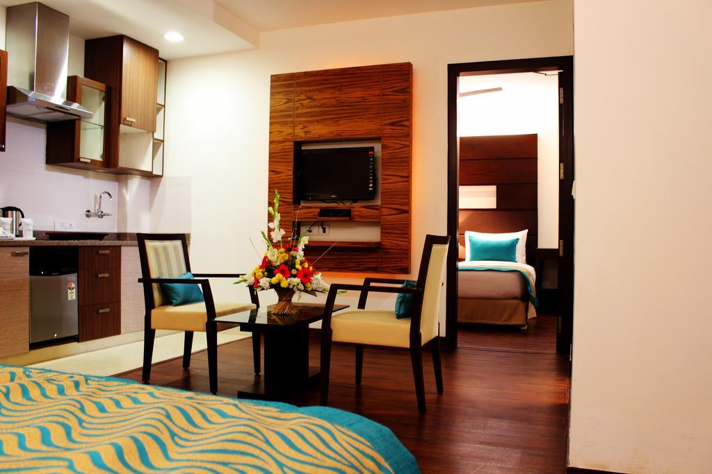 Stately Suites Mg Road Gurgaon Bagian luar foto