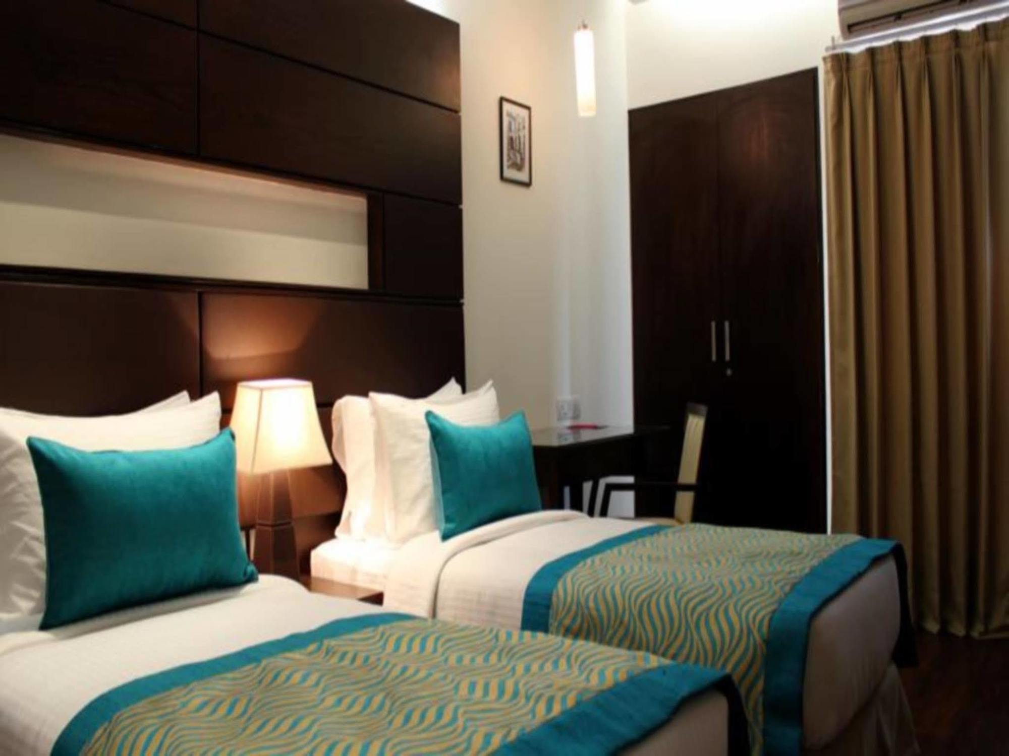 Stately Suites Mg Road Gurgaon Bagian luar foto